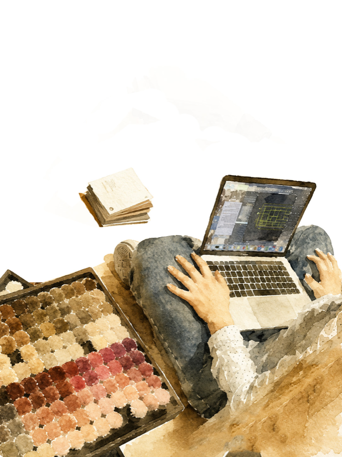 A watercolour of a designer at a laptop beside a tray of colour swatches